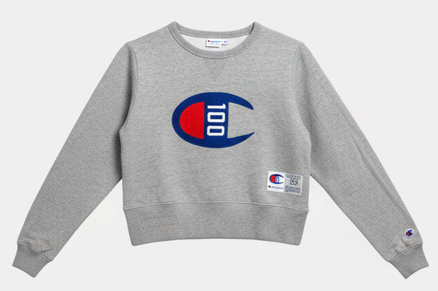 Sudadera cropped Champion 100 aniversario gris