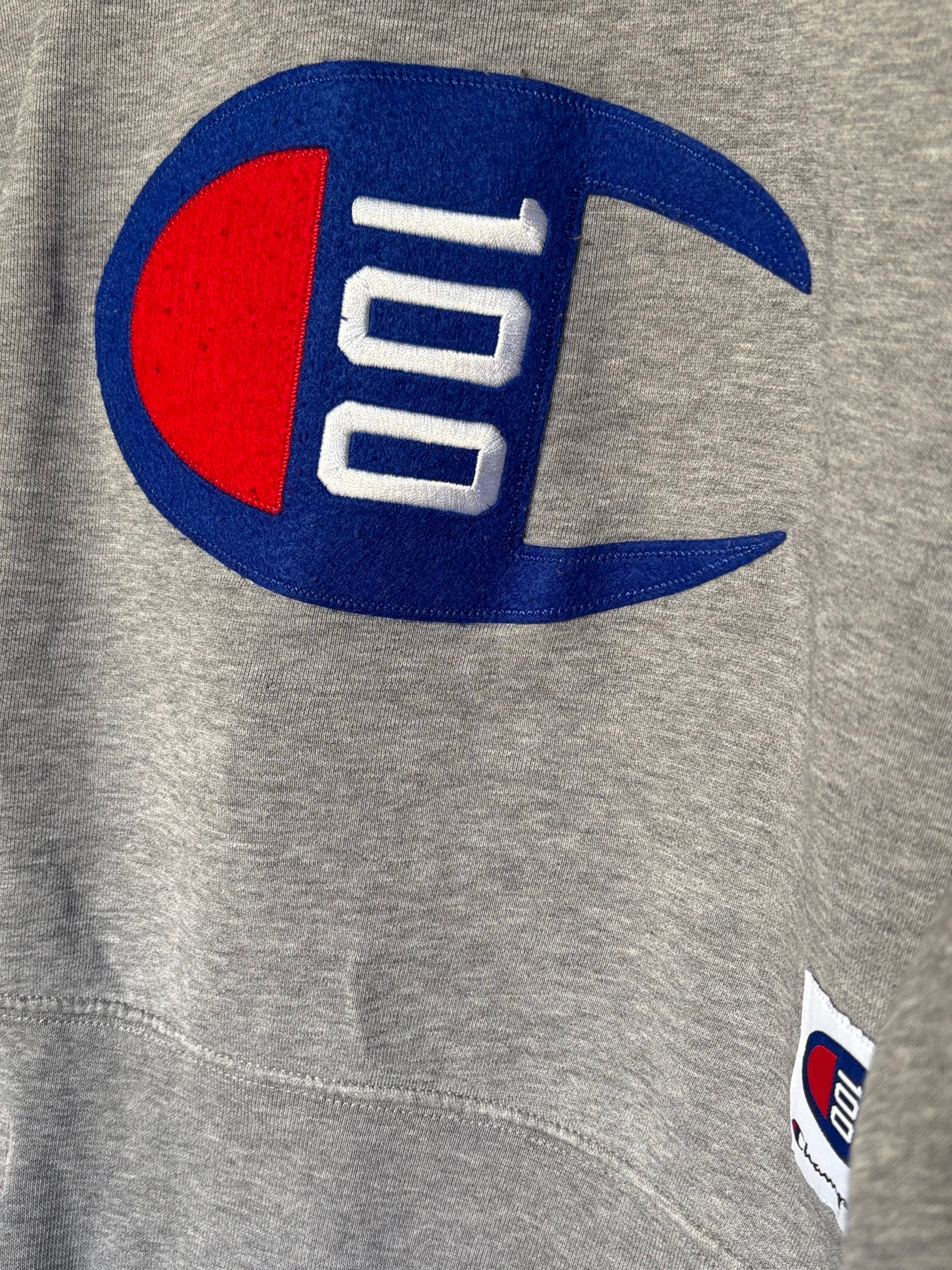 Sudadera cropped Champion 100 aniversario gris